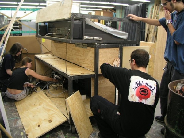 Students working on the new mixer cart
