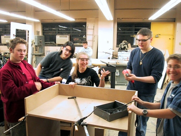 Students building Equip Rack